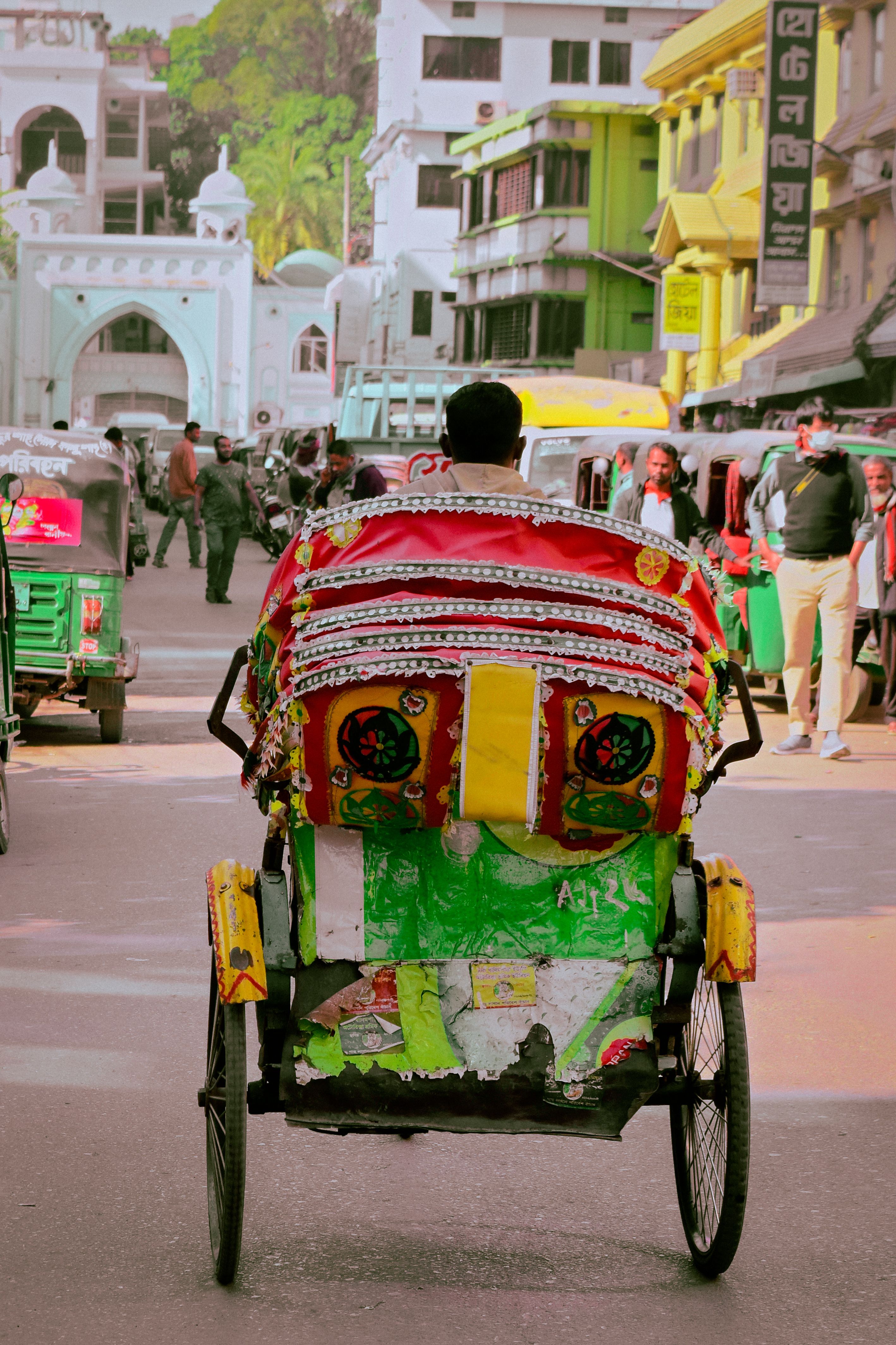 Man Driving Rickshaw Transporting Fruits · Free Stock Photo