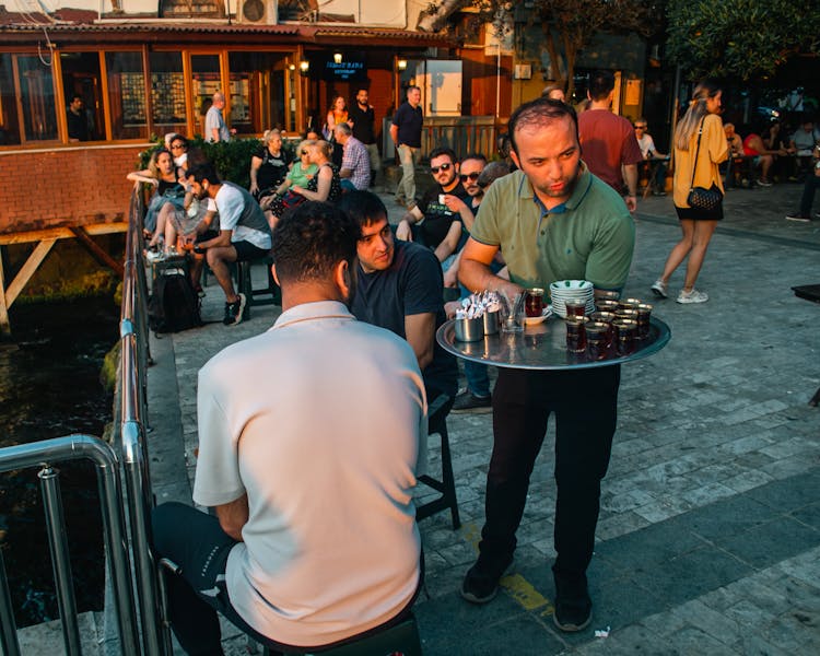 A Man Serving Coffee