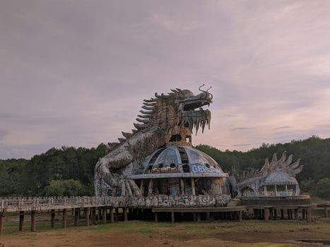 Explore the captivating abandoned dragon structure at Thuy Tien Lake in Hué, Vietnam.
