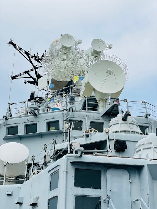 White Satellite Dishes on Watercraft