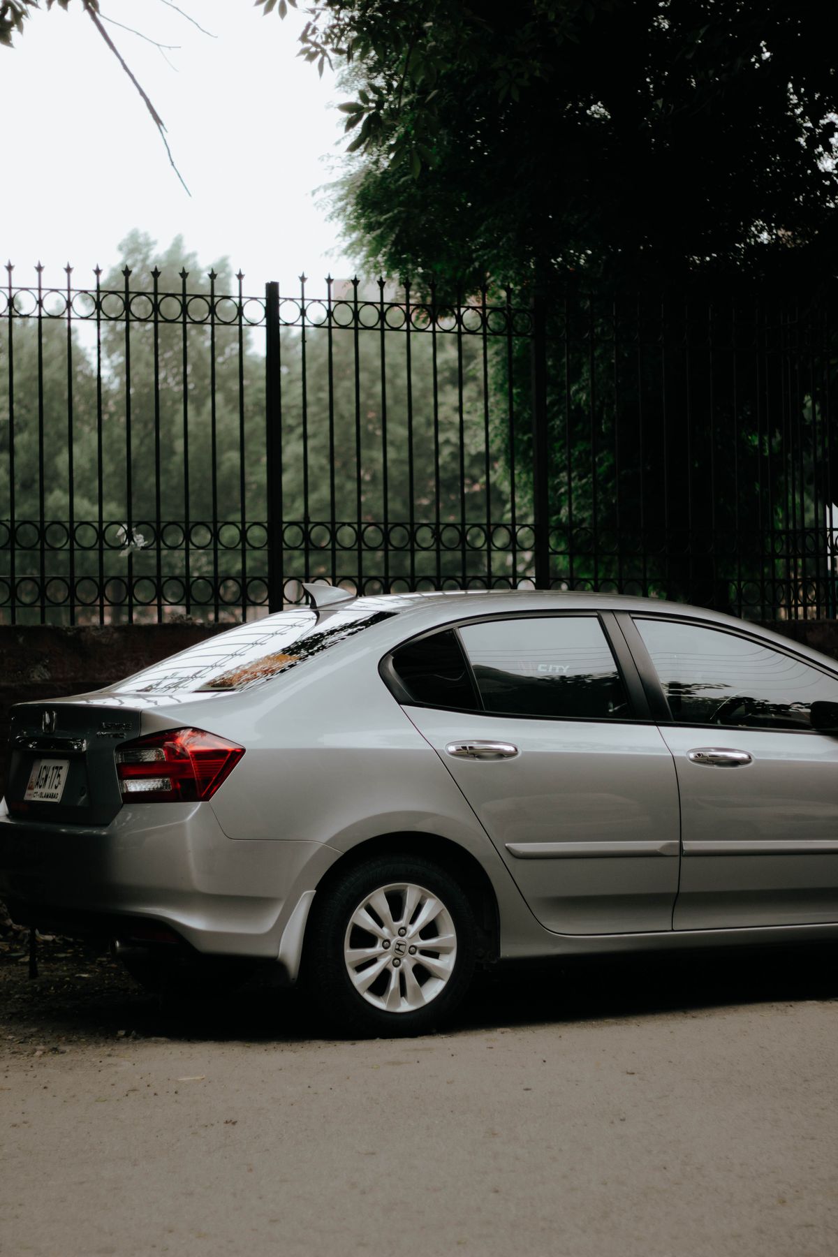 A clean silver sedan parked outdoors, ready for a city sightseeing tour