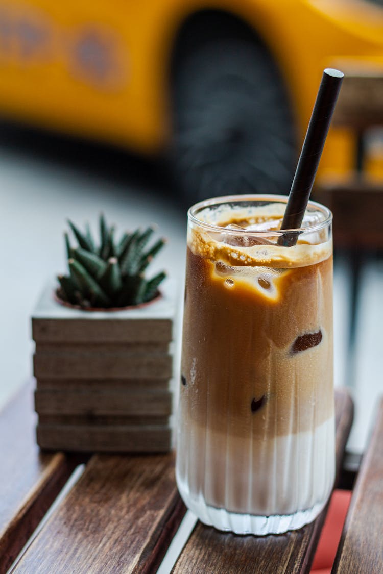 Cold Coffee In Glass On Cafe Table