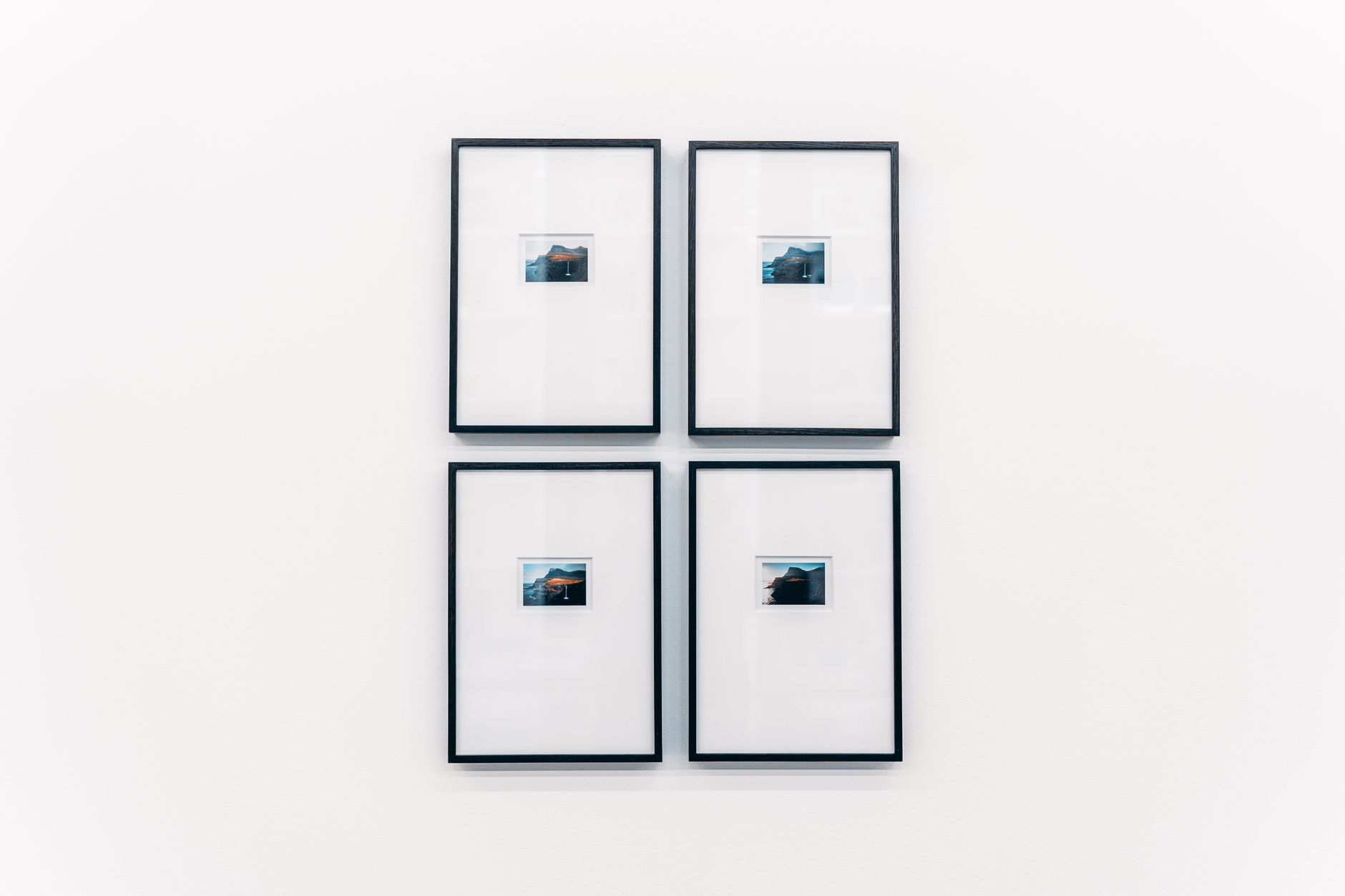A sophisticated minimalist art gallery featuring high-value collectibles under focused museum-grade lighting for elite collectors.