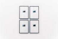 White Frames Mounted on the White Wall
