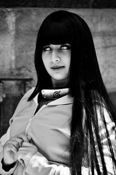 Black and white portrait of a woman dressed as a popular anime character.. black, white, portrait