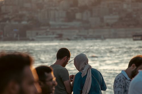 Back View of Woman and Man on Sea Shore in Istanbul