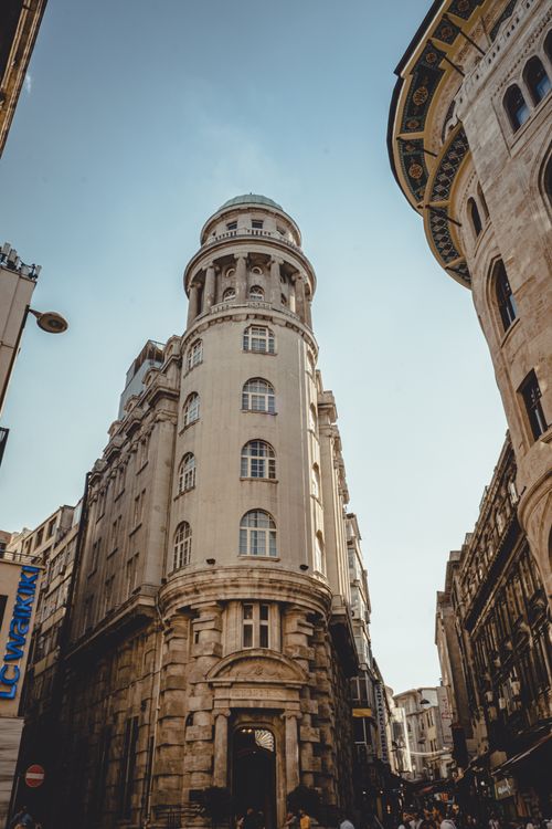 Free A stunning view of historical architecture in Istanbul's Germanya Han area, captured from a low angle. Stock Photo