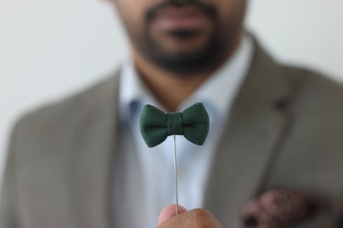 Green Bow Tie Forced Perspective Selective Focus Photo