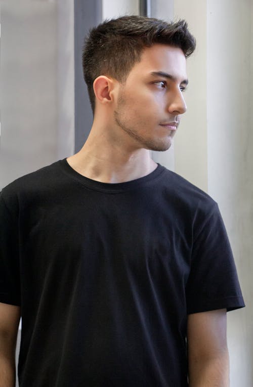 A Man Wearing a Black T-shirt