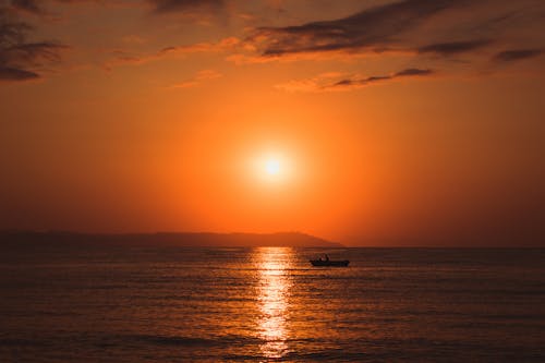 Immagine gratuita di alba, arancia, barca