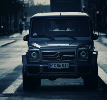 Front view of a luxury SUV parked on a street in Copenhagen, Denmark.