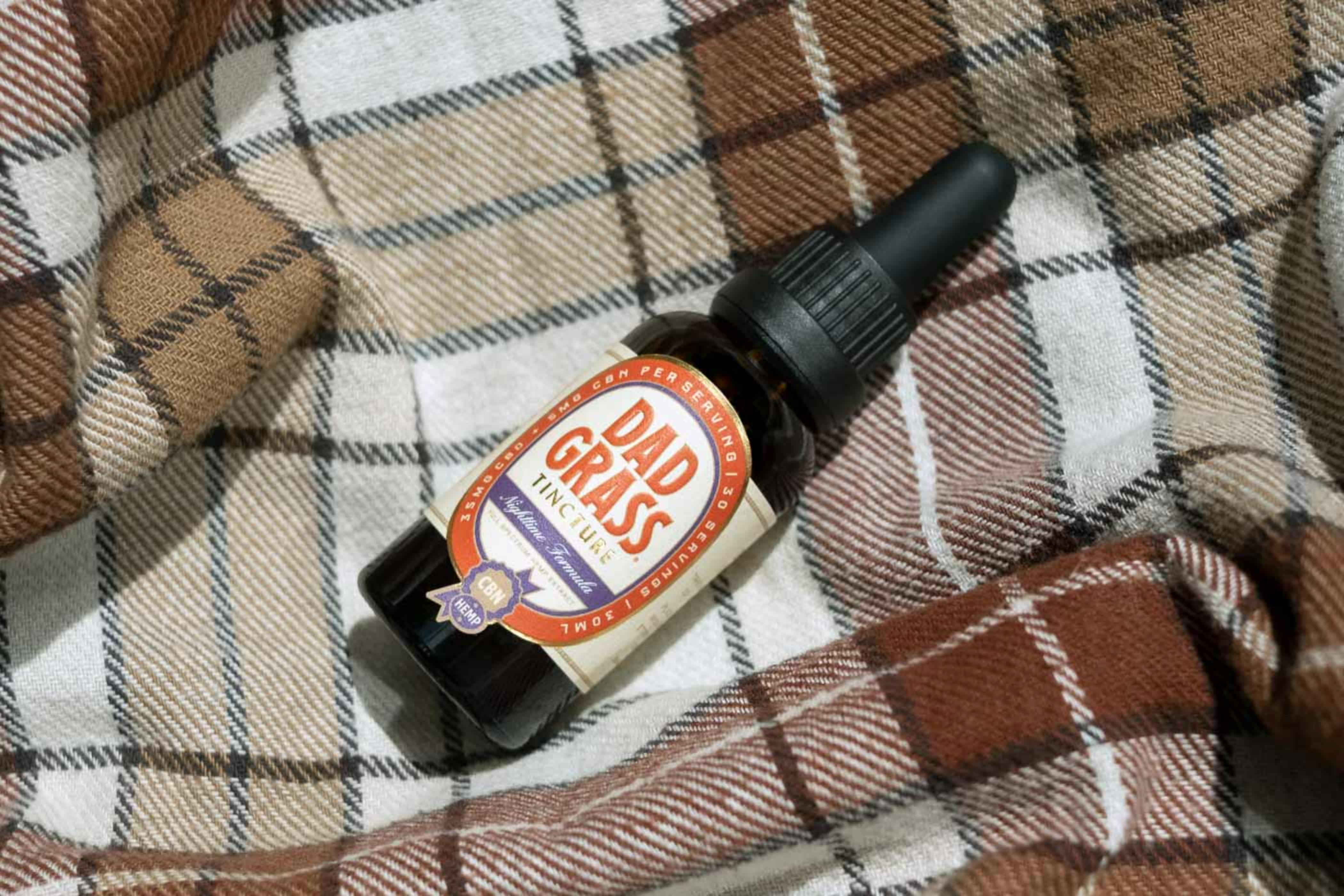 Medical patient using cannabis tincture sublingual drops at home