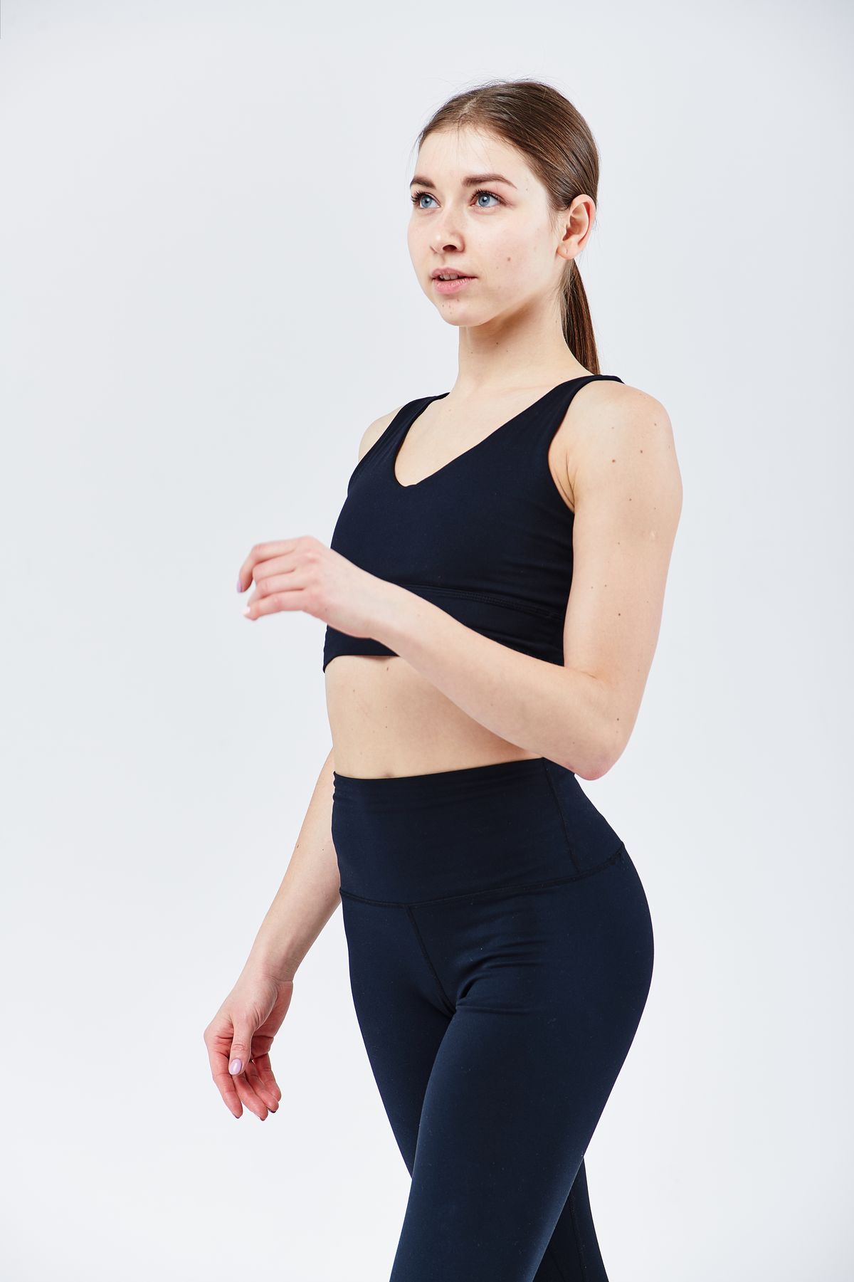Woman in black sleeveless training top