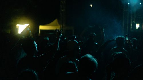 Free Vibrant crowd enjoying a lively night concert in Istanbul, Türkiye. Stock Photo