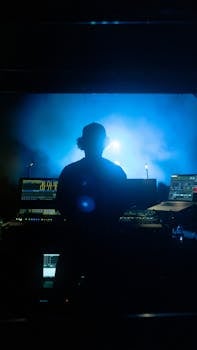 Silhouette of a DJ mixing music at a vibrant nightclub in Istanbul.