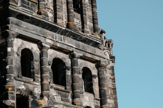 Closeup of Gray Stone Ancient Architecture against Pastel Blue Sky
