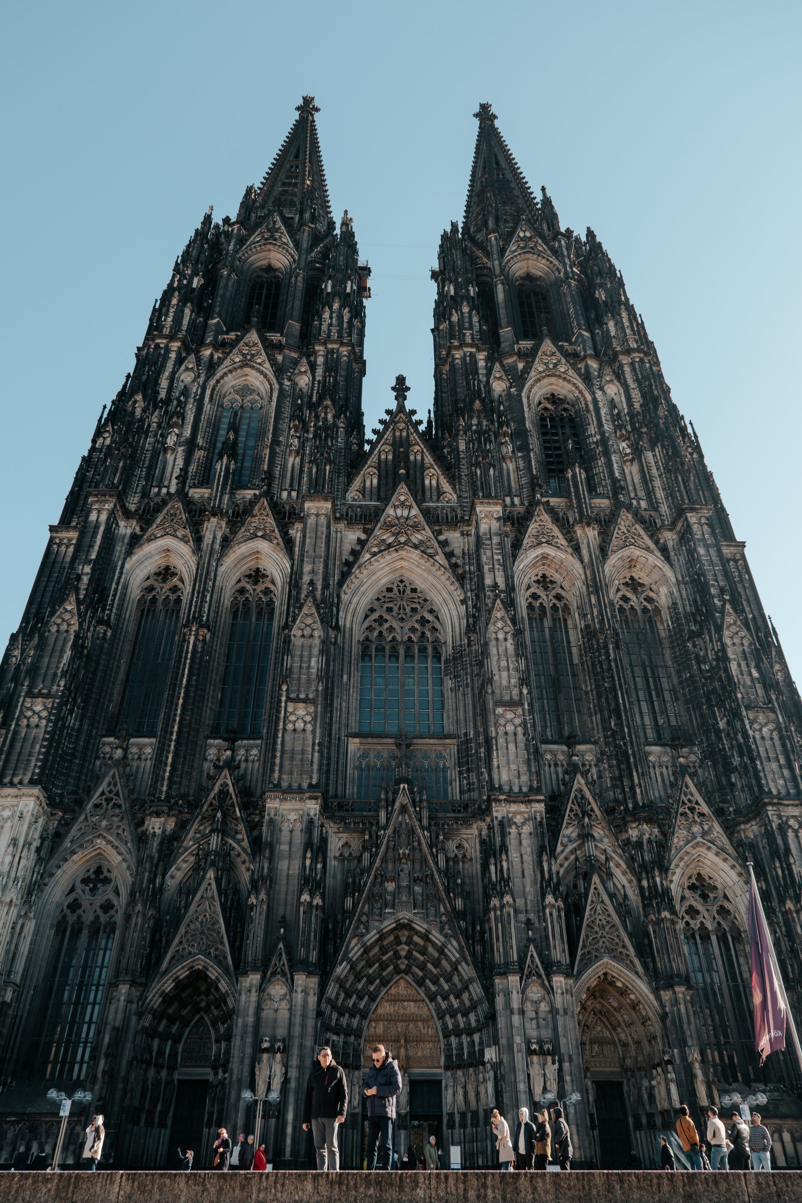 Low Angle Shot of the Cologne Cathedral · Free Stock Photo