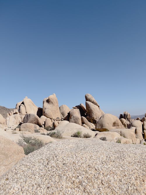 Brown Rock Formations Under Blue Sky