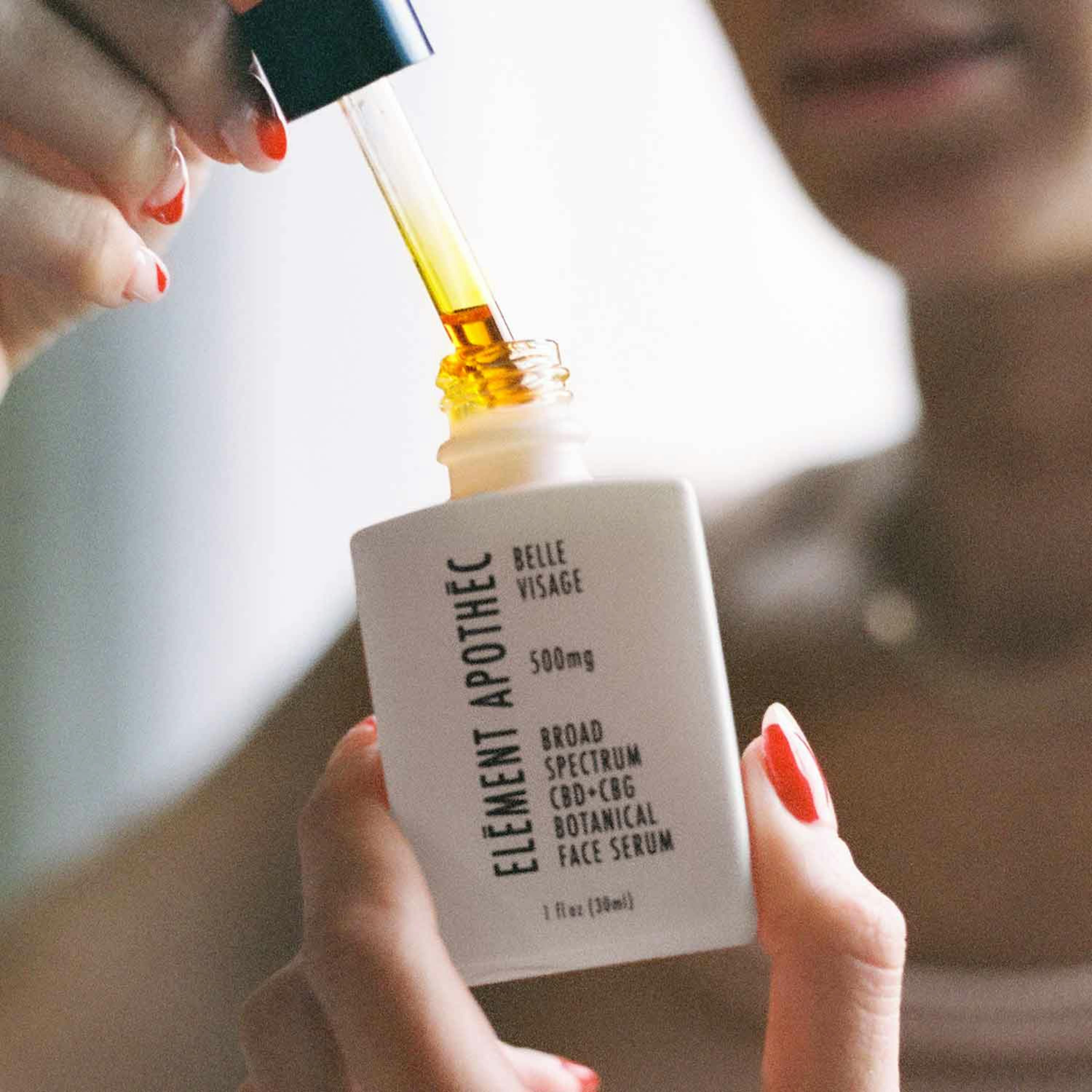 woman using serum