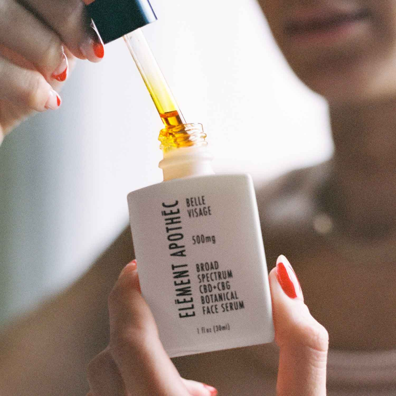 woman using serum