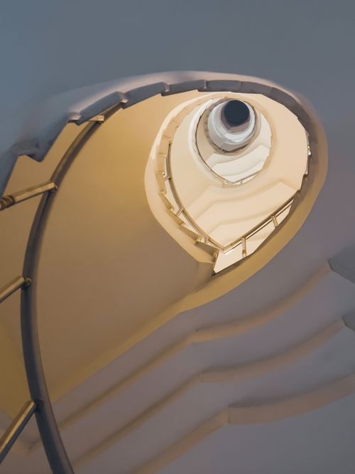 Free Captivating upward view of a spiral staircase in Gaziantep, Turkey, showcasing architectural elegance. Stock Photo