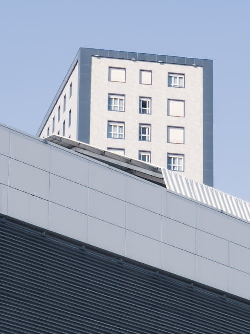 Geometric City Buildings against Blue Sky