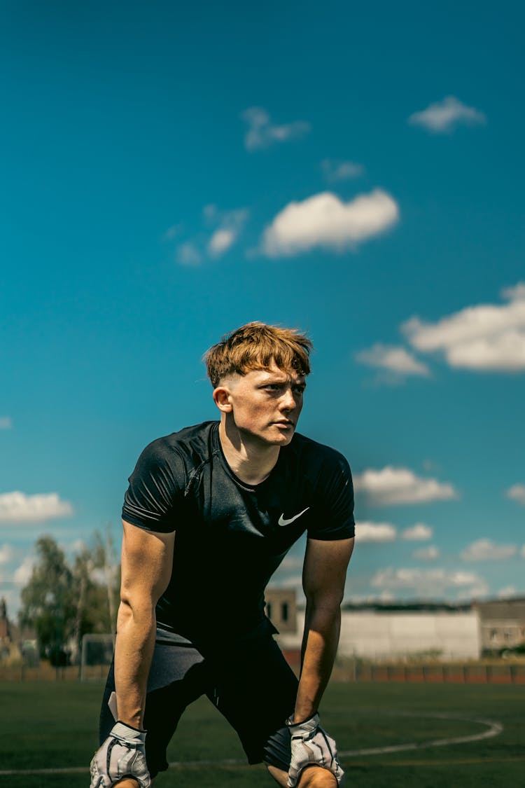 Photograph Of A Serious Man In A Black Shirt