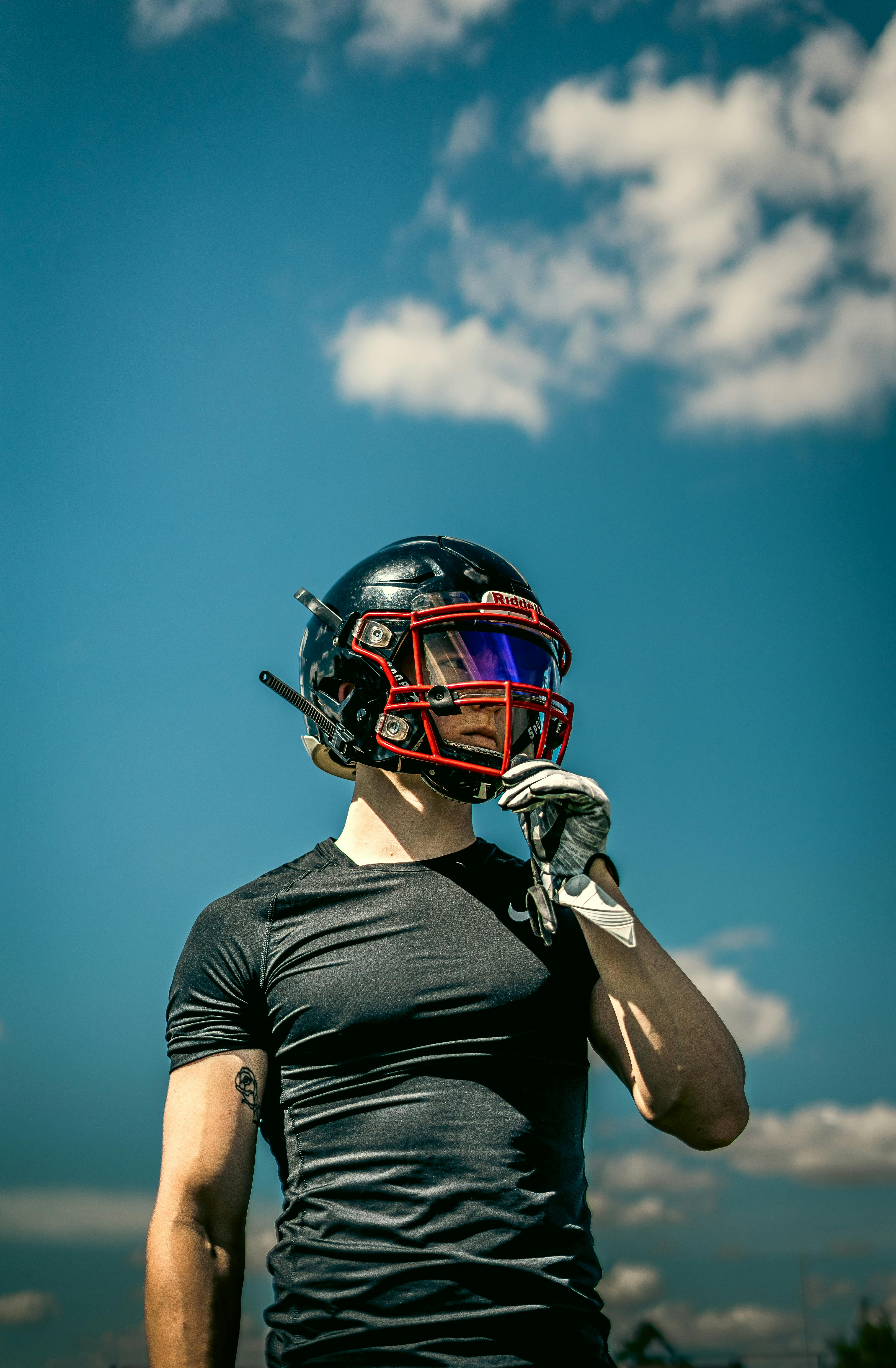 Football player in helmet, representing the determination Willie Thrower showed at Michigan State