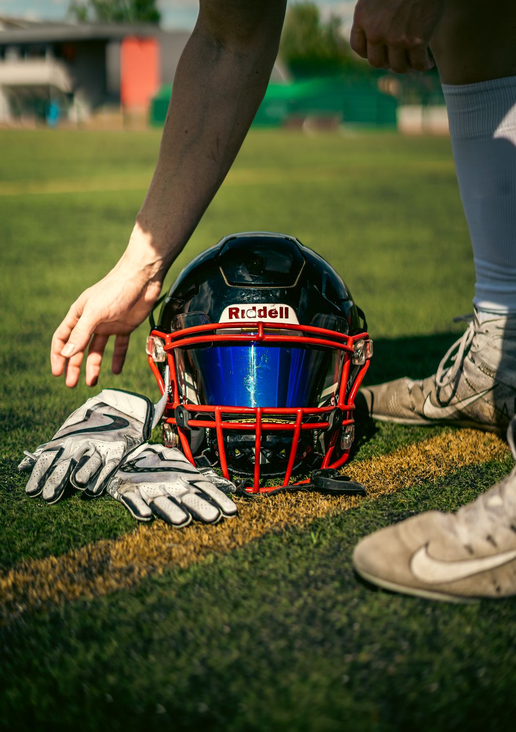 A Football Player Gear on the Grass · Free Stock Photo