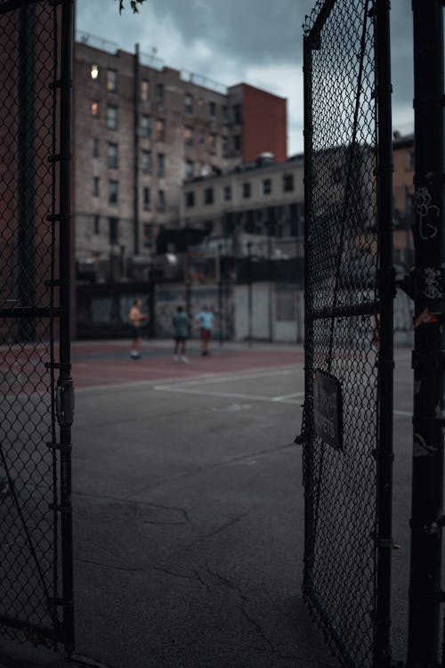 A Chain Link Fence Near a Basketball Court · Free Stock Photo A Chain Link Fence Near a Basketball Court · Free Stock Photo
