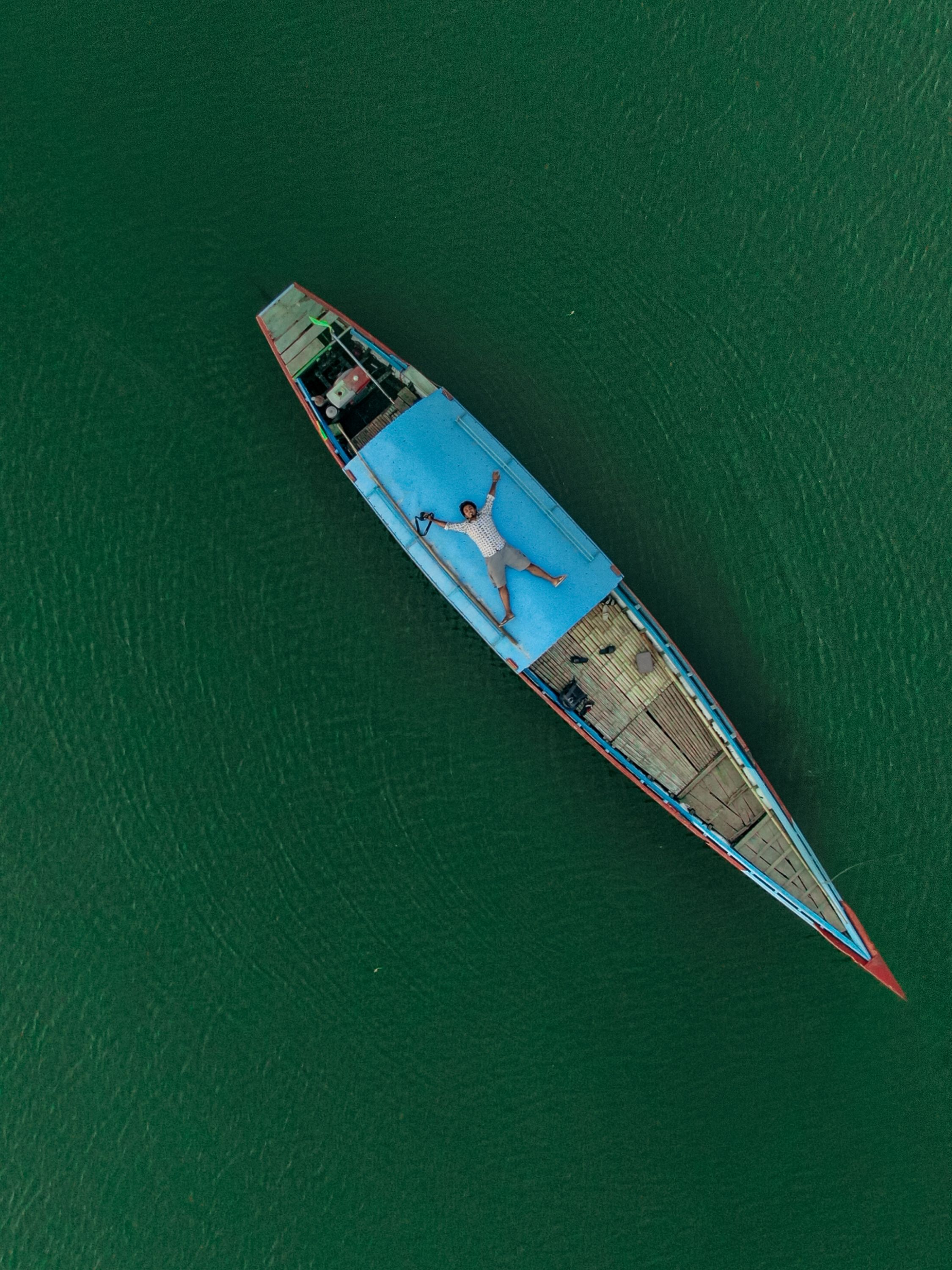 Person on Boat in Birds Eye View · Free Stock Photo