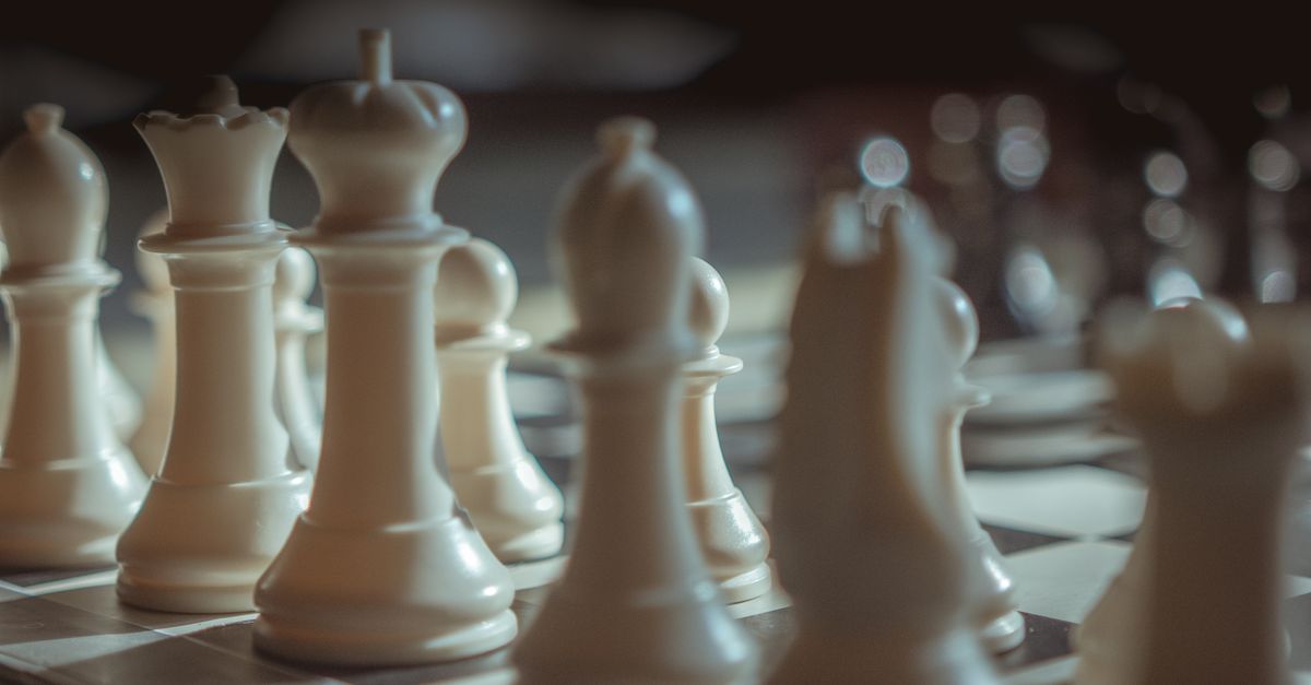 Close-Up Shot of Chess Pieces · Free Stock Photo