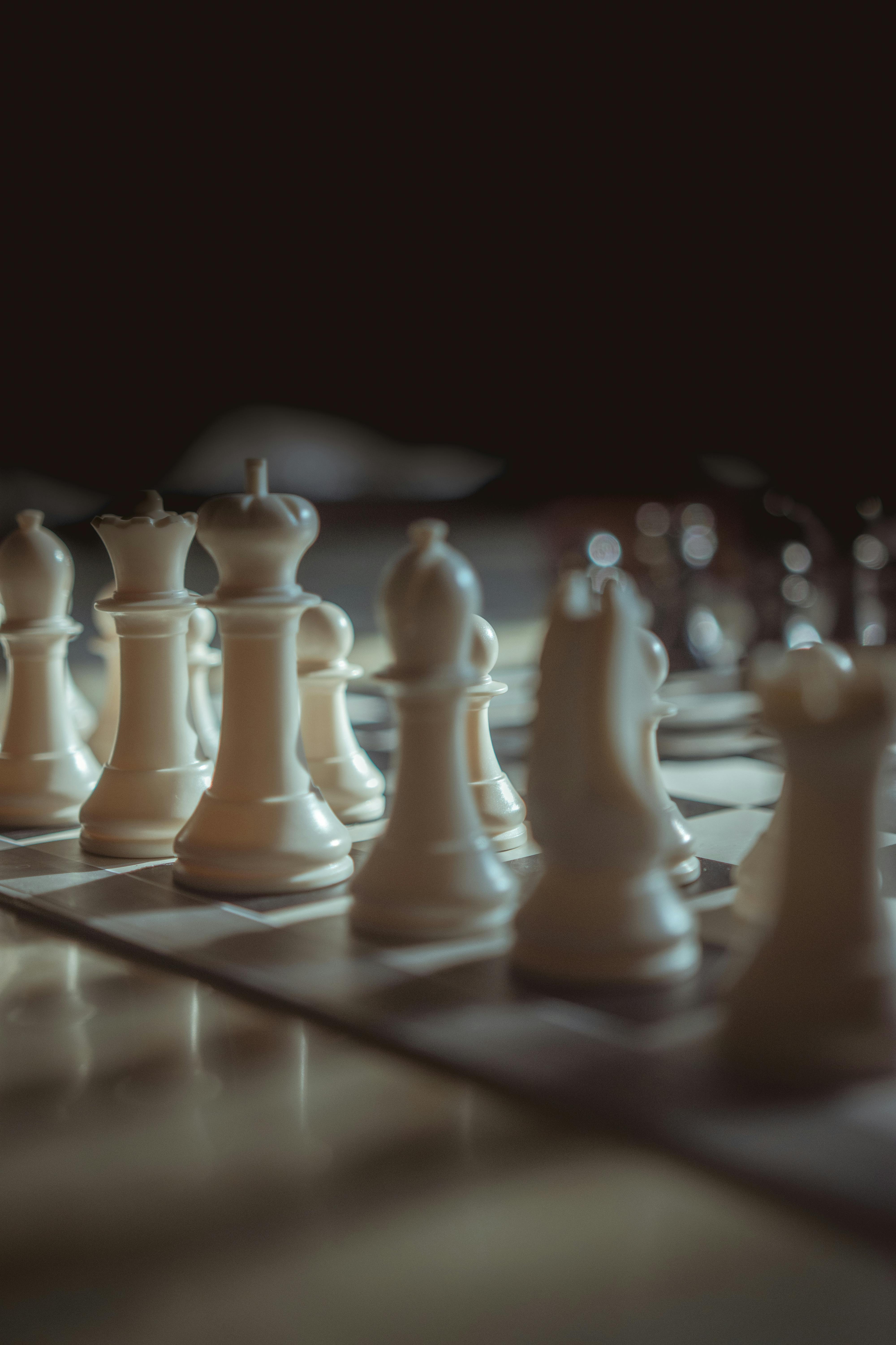 Close-Up Shot of Chess Pieces · Free Stock Photo