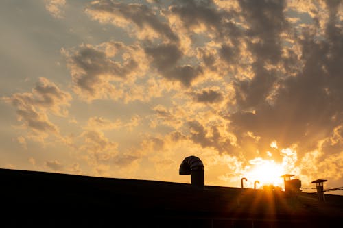 Kostenloses Stock Foto zu sonnenaufgang auf dem dach