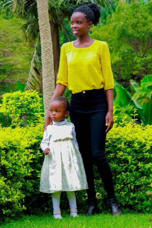 Photo of a Mother Smiling with Her Child