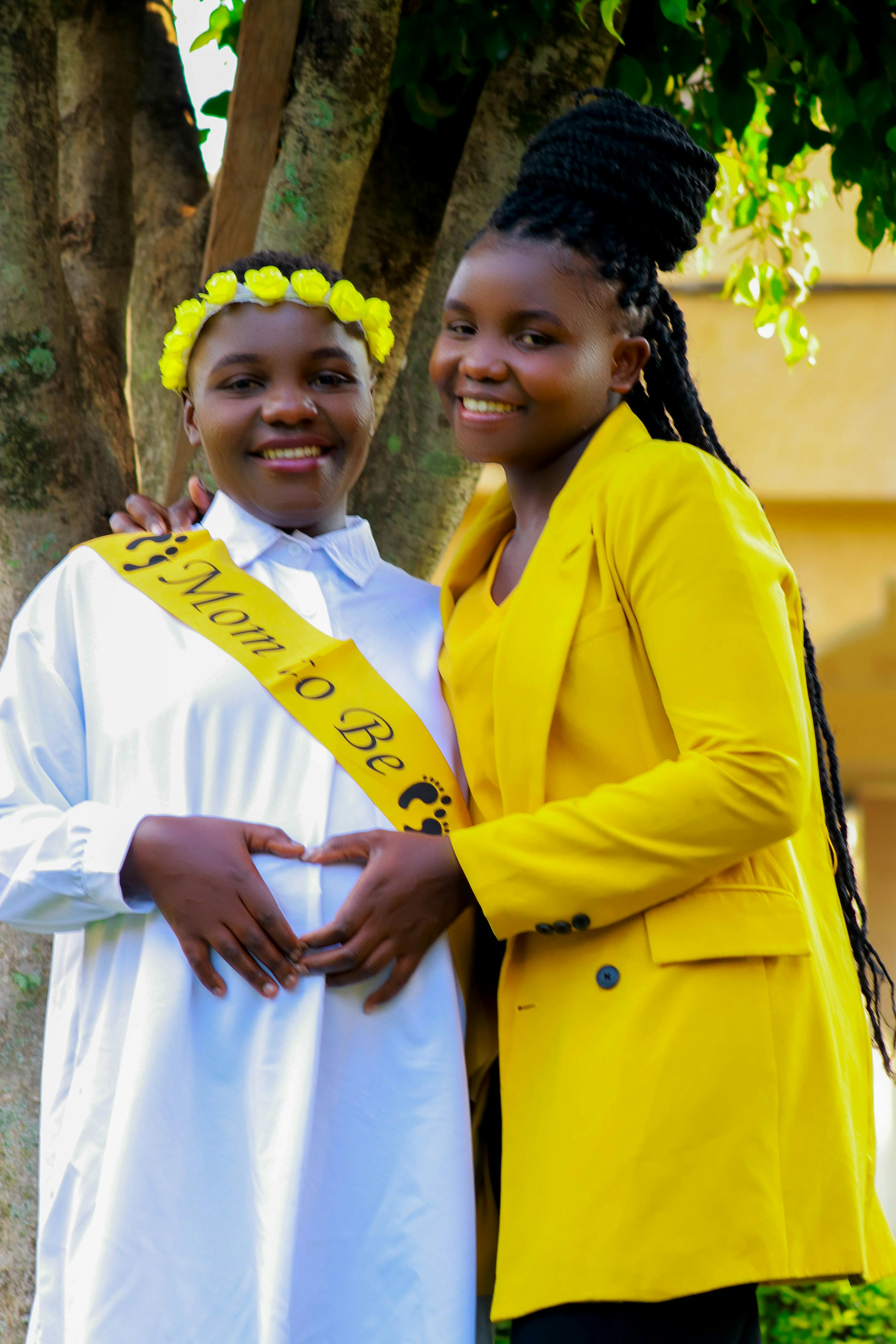 women smiling at the camera