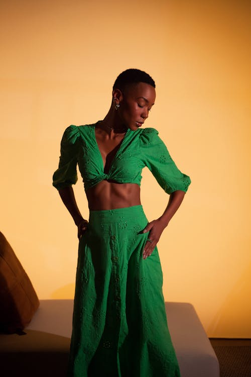 A Woman Wearing Green Crop Top