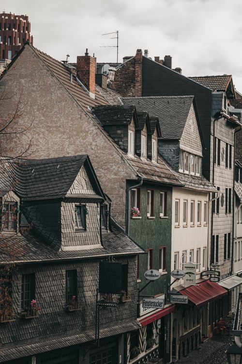 Free Beautiful historic buildings lining a quaint street in a charming old town, perfect for travel themes. Stock Photo
