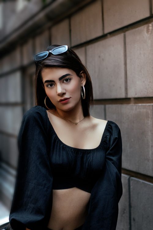 Free Elegant woman posing in Mexico City street setting, showcasing modern fashion. Stock Photo