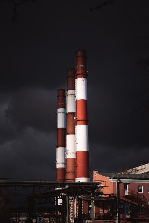 Red and White Industrial Chimneys
