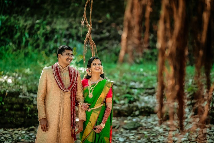 Smiling Couple Linking Arms