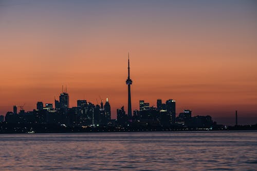Silhouette of CN Tower in Toronto During Sunset