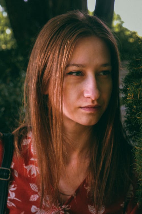 A Woman in Red Printed Shirt