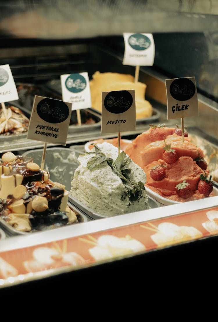 Assorted Flavors Of Gelato With Toppings