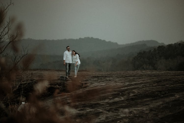 A Happy Couple Walking Together 