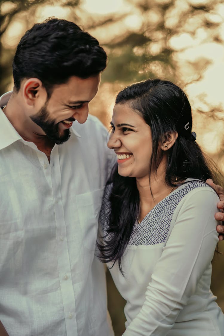 Portrait Of A Couple Laughing