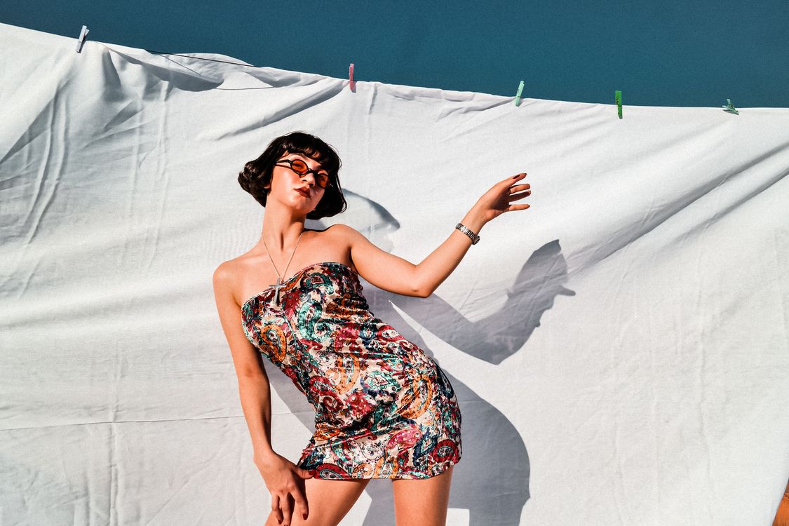 Woman in thrifted maxi dress outfit