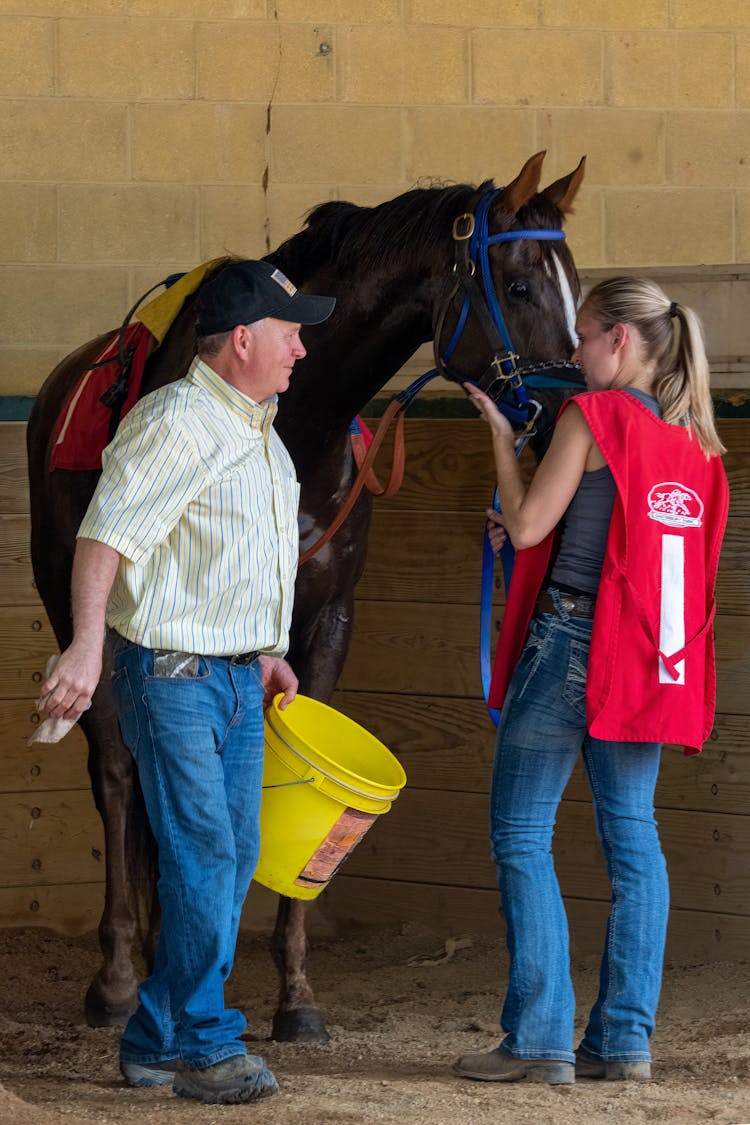 People With A Horse In Stables