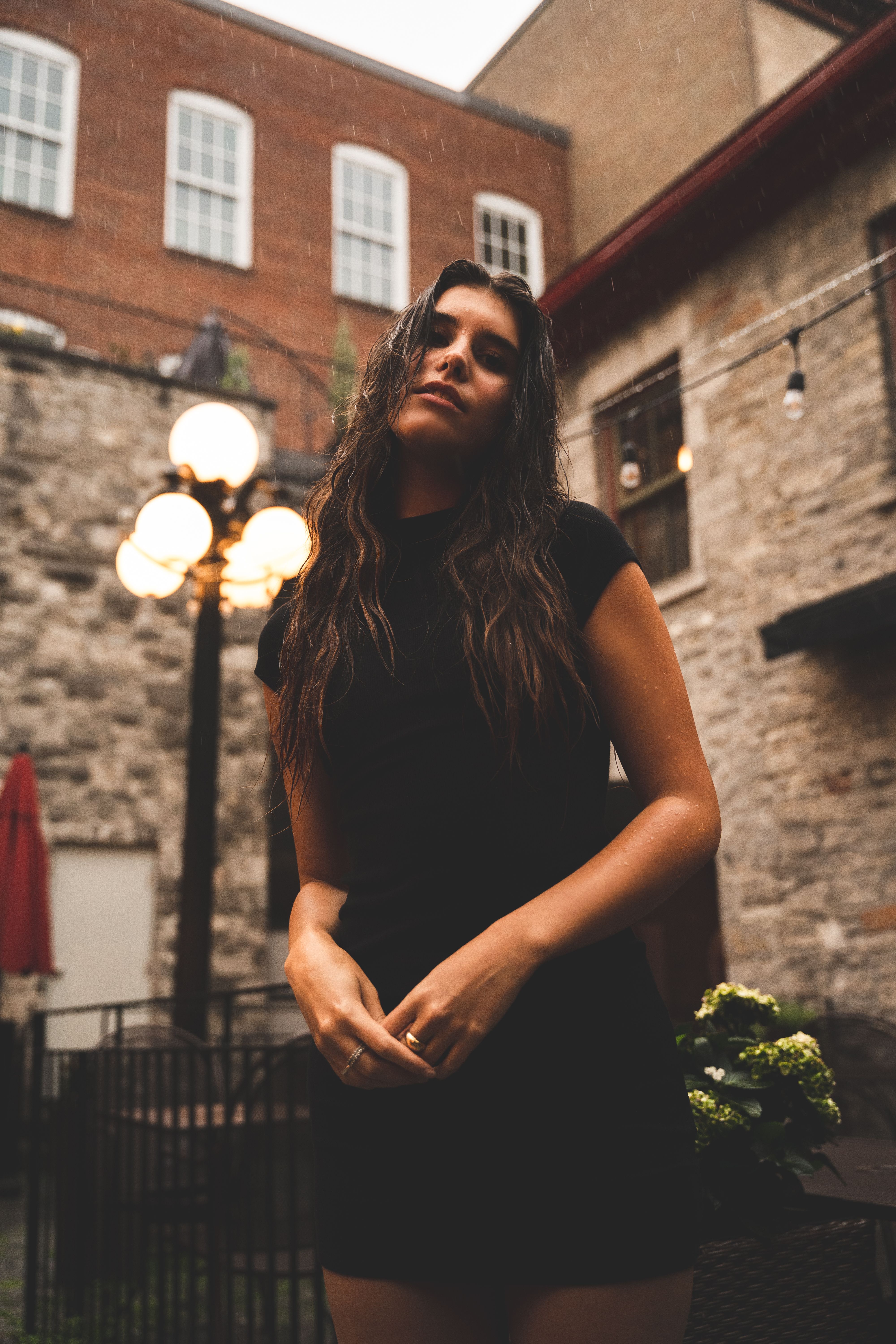 A Woman in Black Dress Posing · Free Stock Photo
