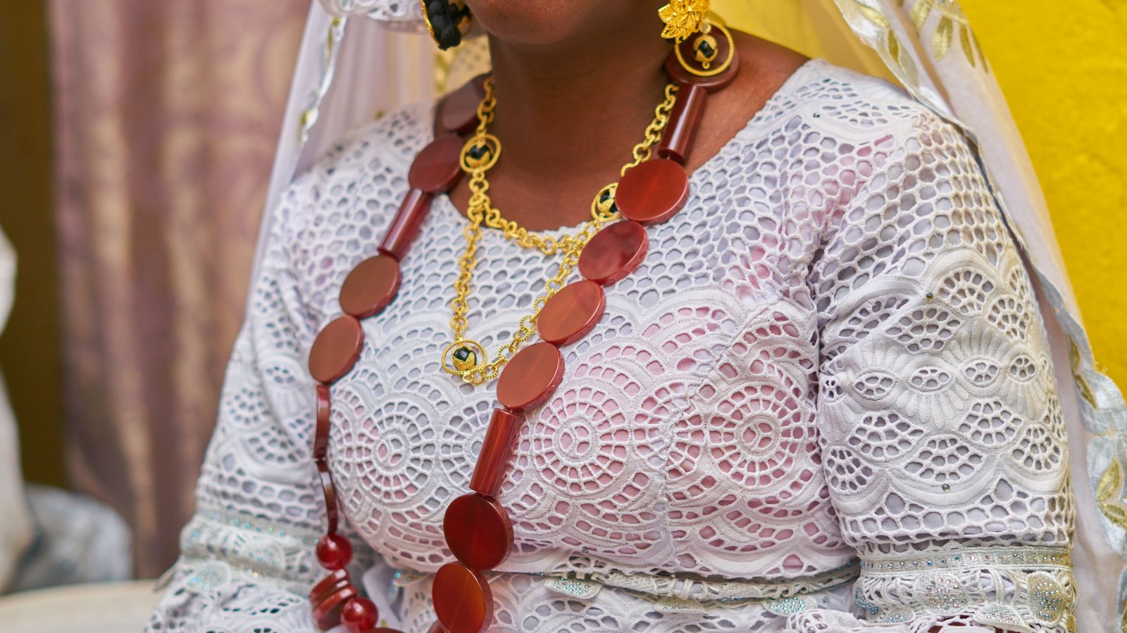 Woman in lace dress, Comoros
